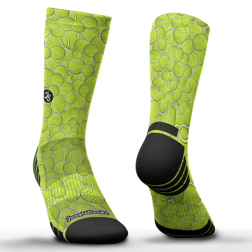 Technische Padel-Socken, Design mit gelben Bällen, nahtlos, ideal für Grip und Bremsen.