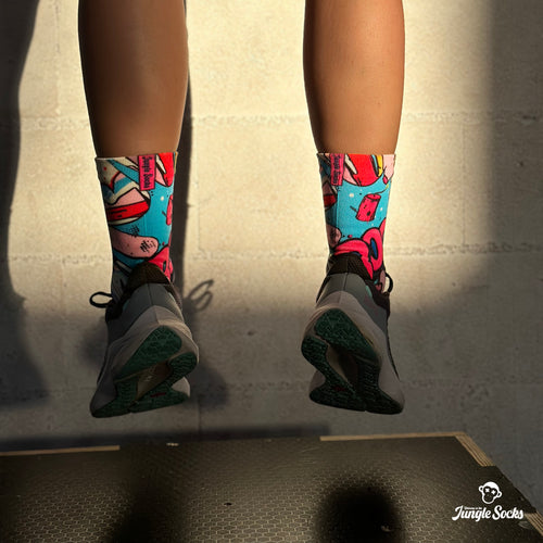 Technische CrossFit-Socken Pink Boom mit buntem Pop-Art-Design, technisch und nahtlos.